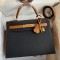 Hermes Kelly Sellier 28 Bicolor Bag in Black and Gold Epsom Calfskin